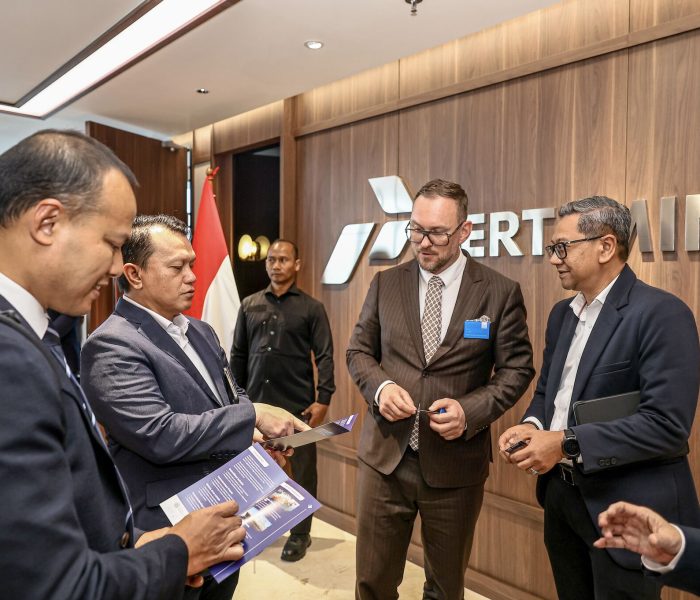 Ivo Pukk exchanging business cards with Pertamina's team in Jakarta